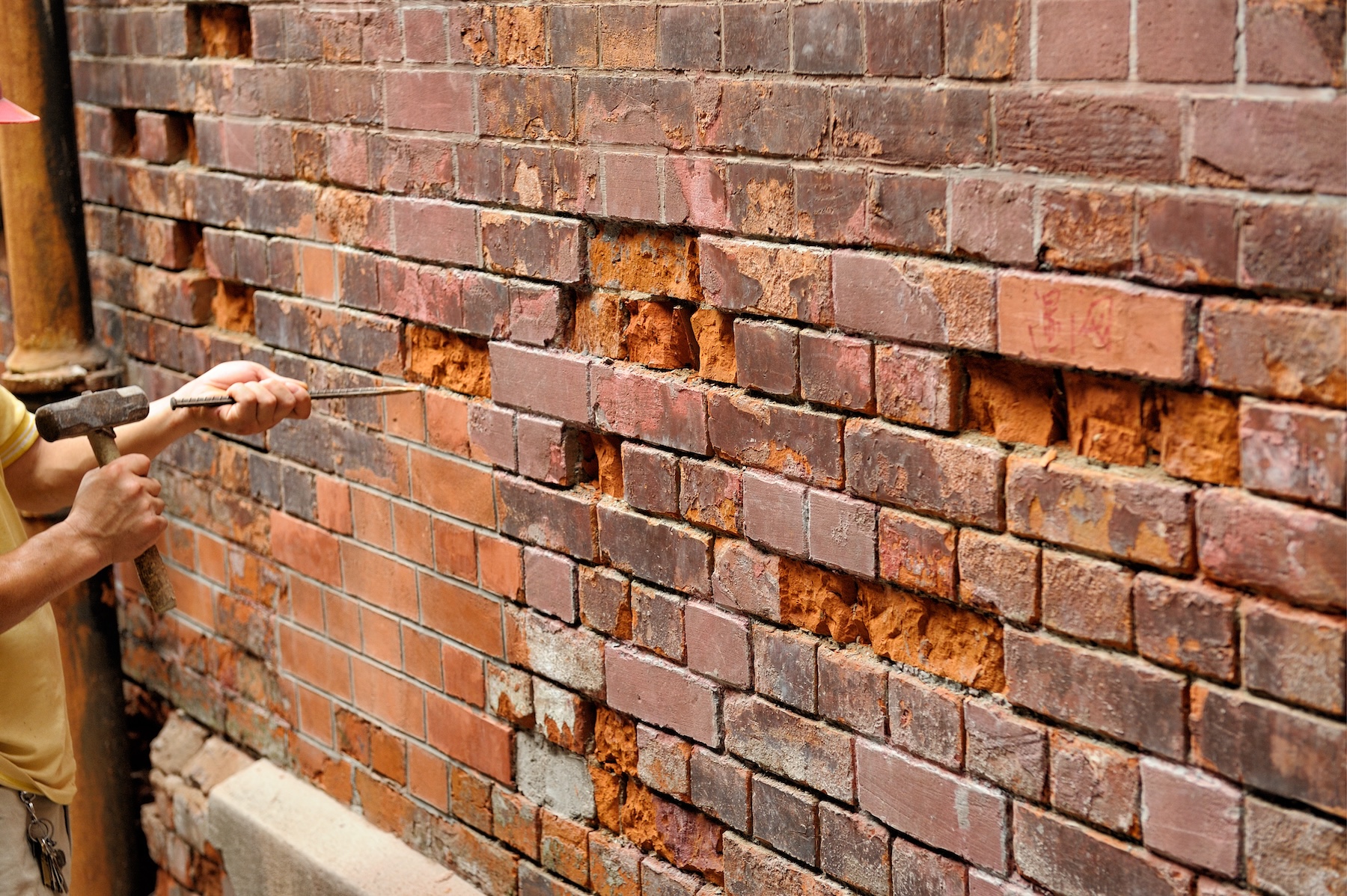 Brick and Stone Flat Work Repair on cracked wall