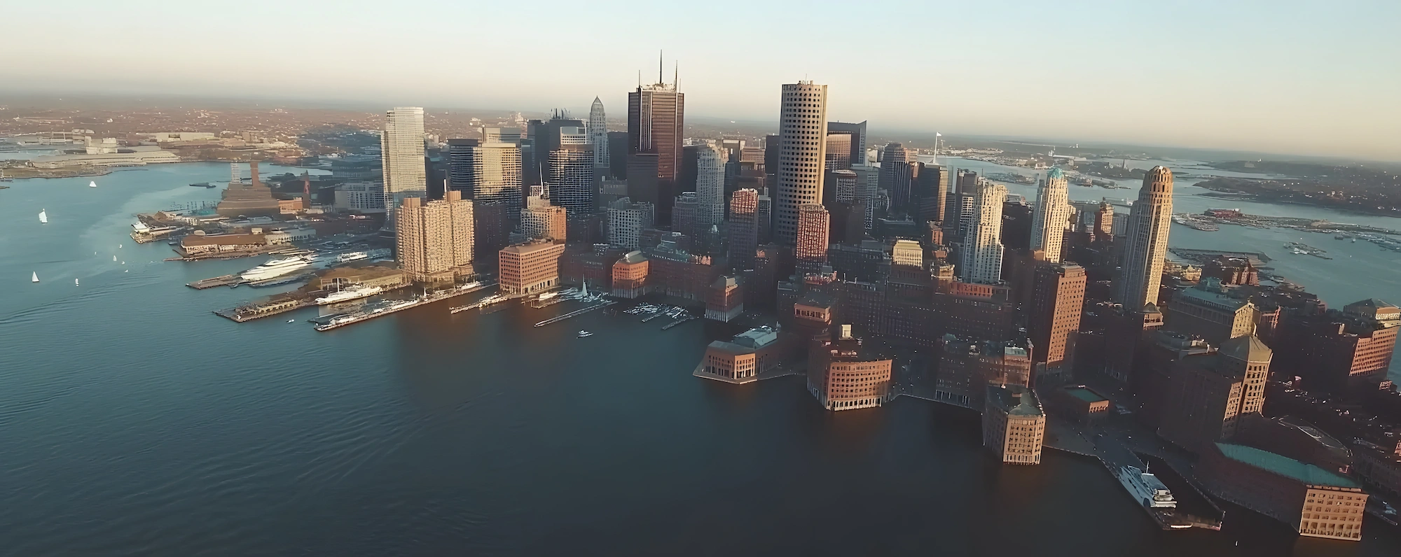 aerial view of a large city by the ocean