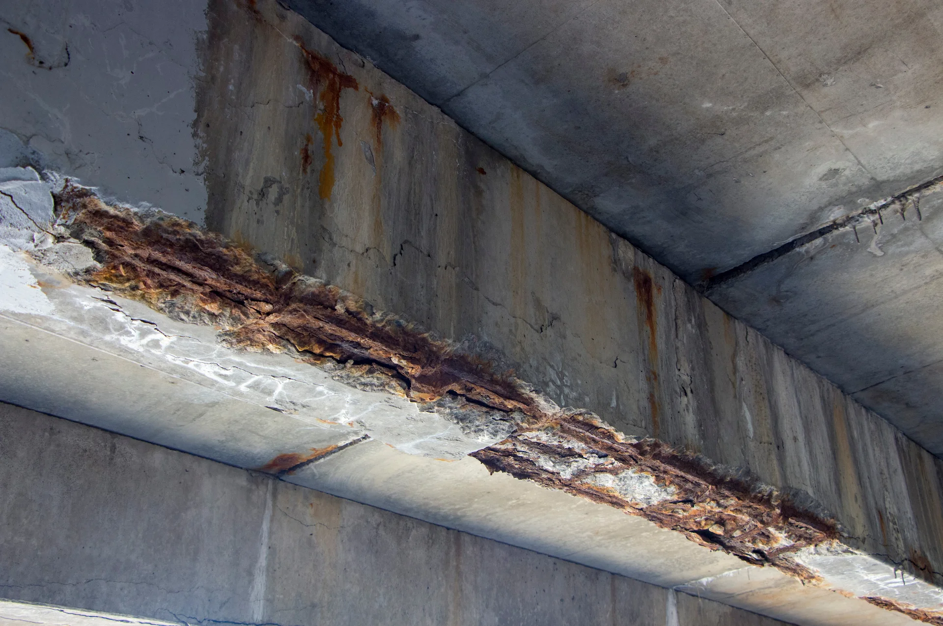 leaking parking garage walls and ceiling structures. water infiltration in parking structures