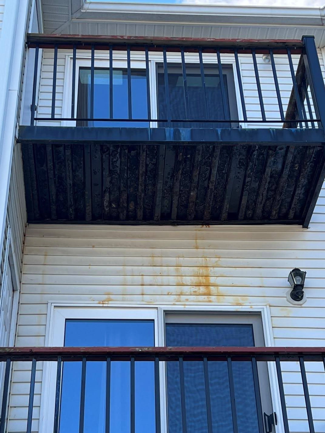 rusty balcony overhang