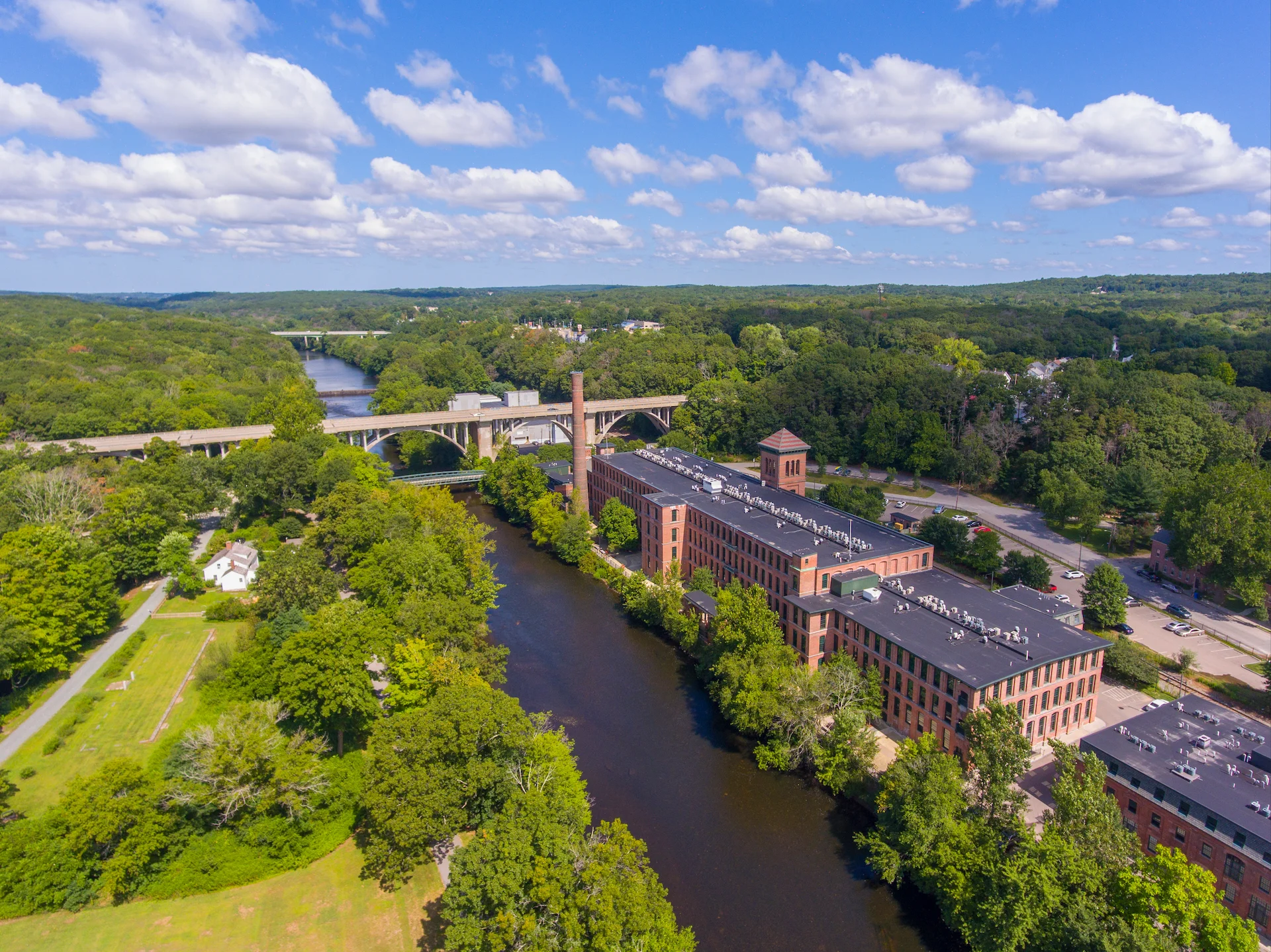 river running by a factory