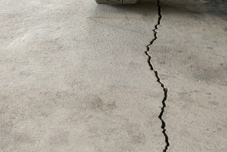crack in the cement floor of a parking garage
