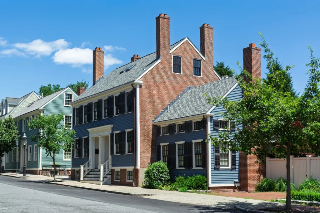 brick house with clapboard siding