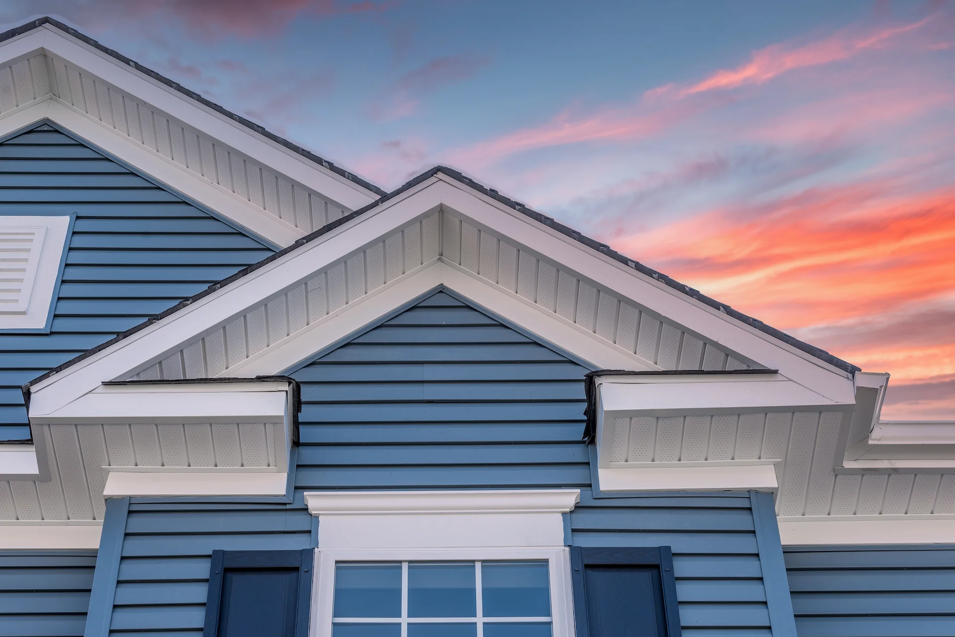 PVC clapboard siding installation on New England commercial property