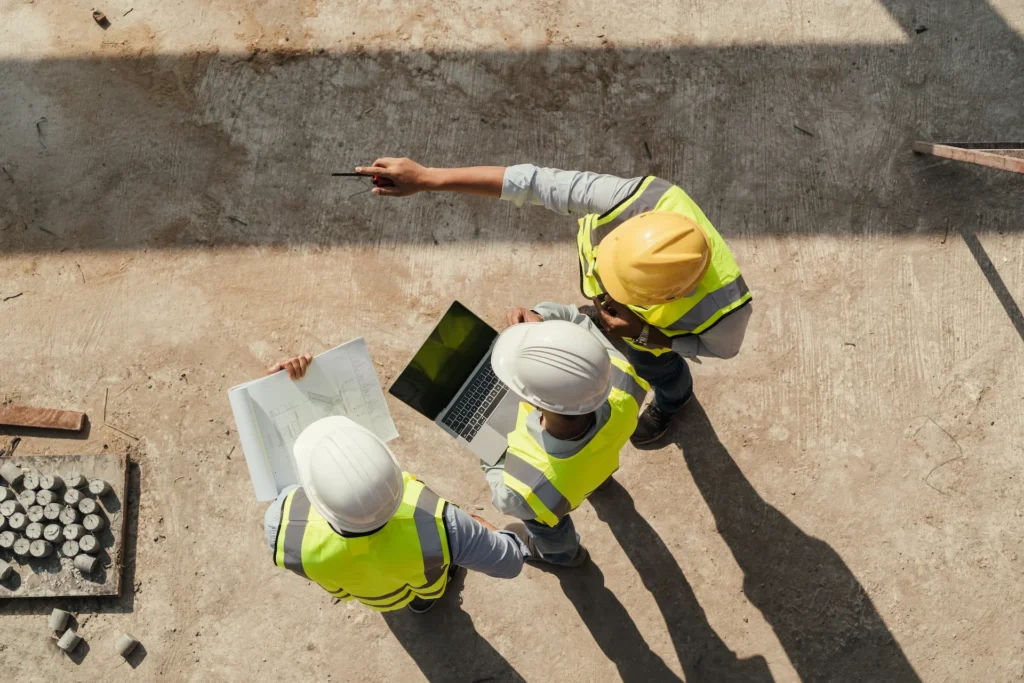 three contractors directing a new project