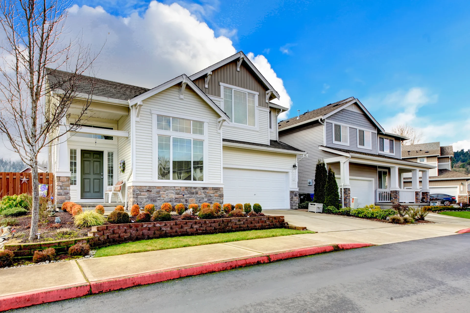 modern houses with clapboard in a neighborhood